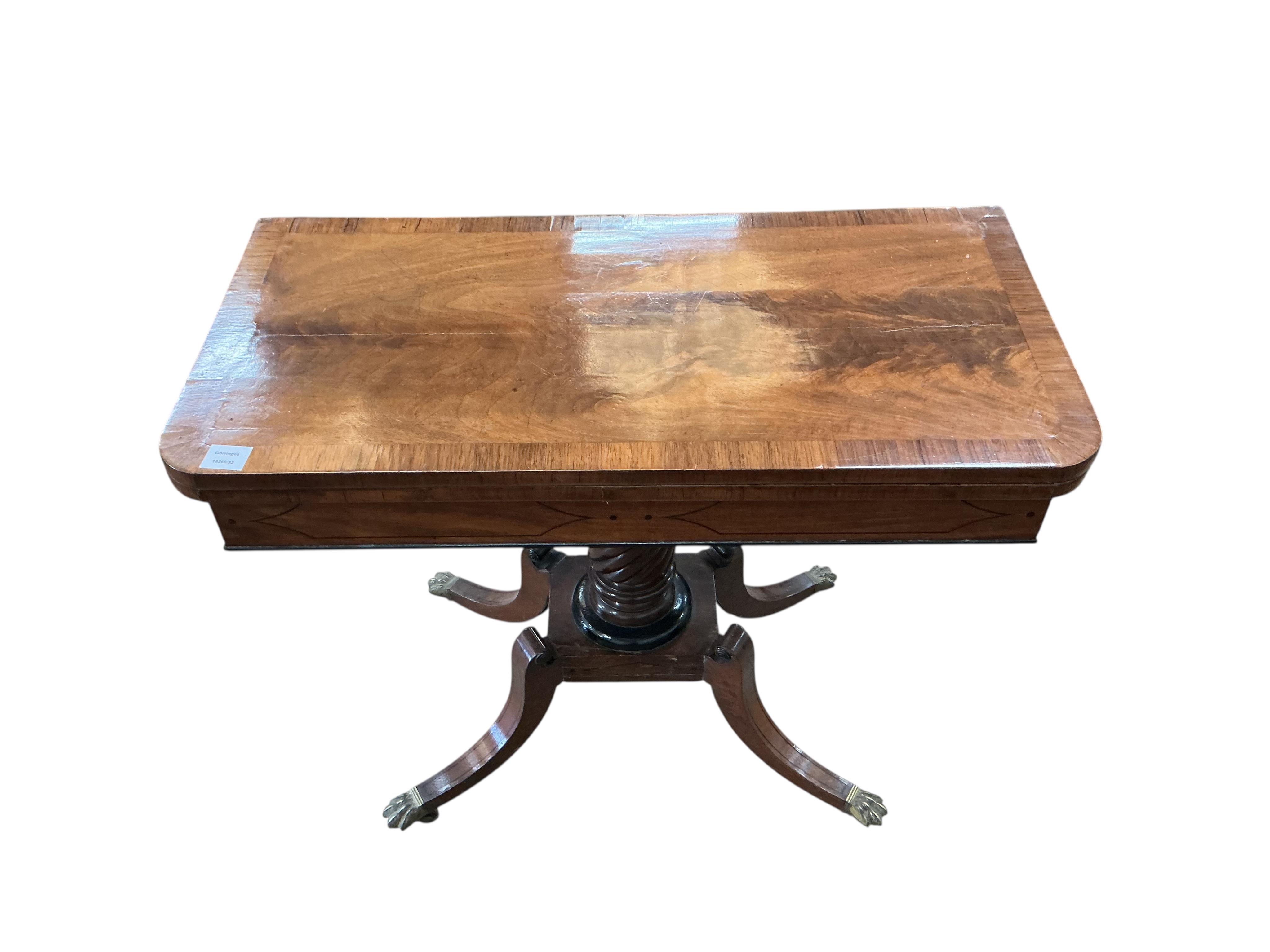 A Regency rosewood banded rectangular mahogany folding card table, width 91cm, depth 45cm, height 73cm